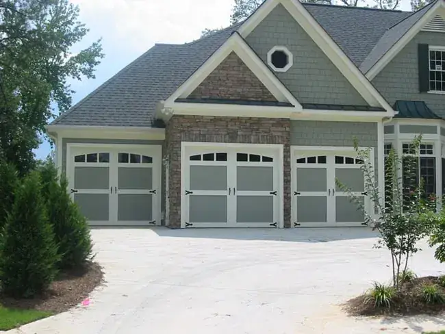 Three-bay carriage style doors
