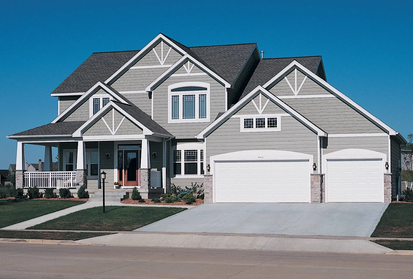 Garage door repair in Cumming, GA — spring and cable replacement
