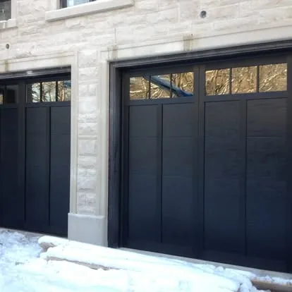 Modern luxury black garage door install on an Atlanta home